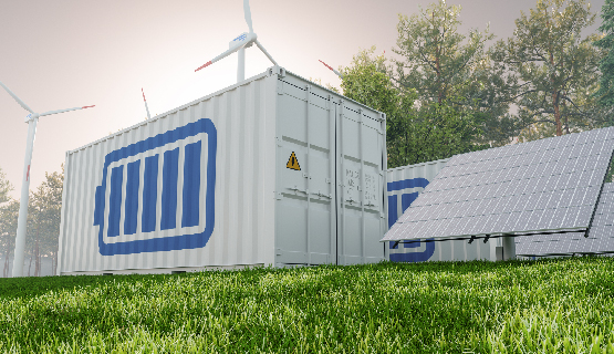 Two battery energy storage systems located near windmills.